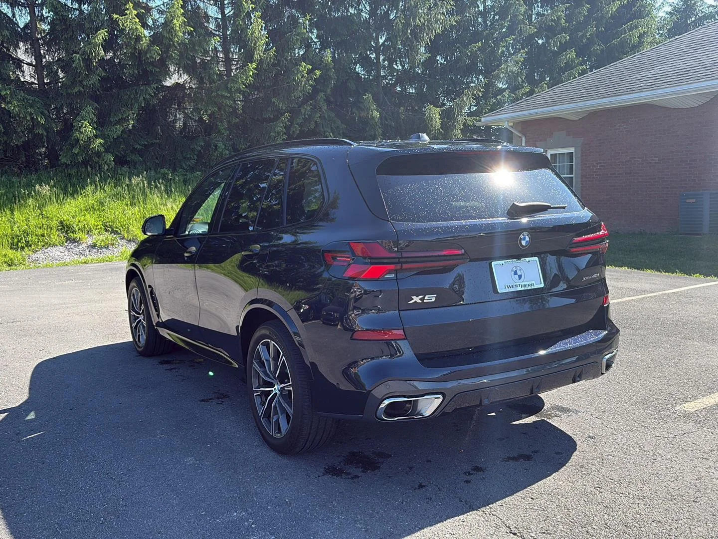 Used 2024 Carbon Black Metallic BMW xDrive40i image 5