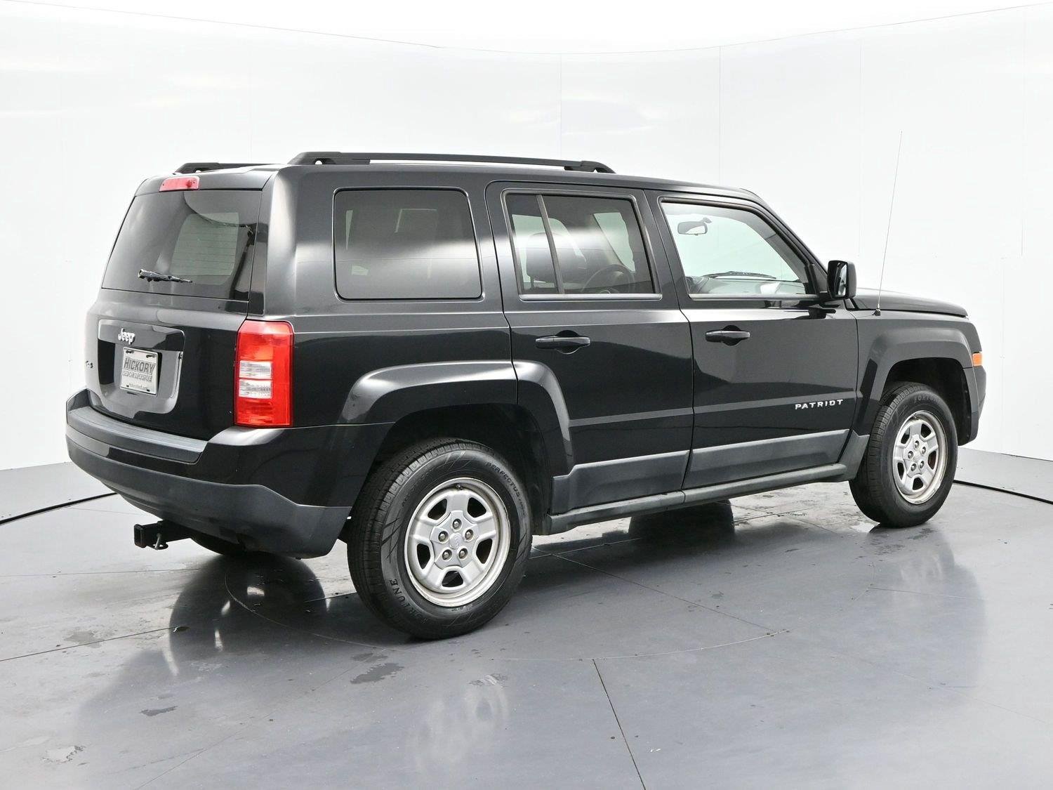 Used 2011 Brilliant Black Crystal Pearl Jeep Sport image 7