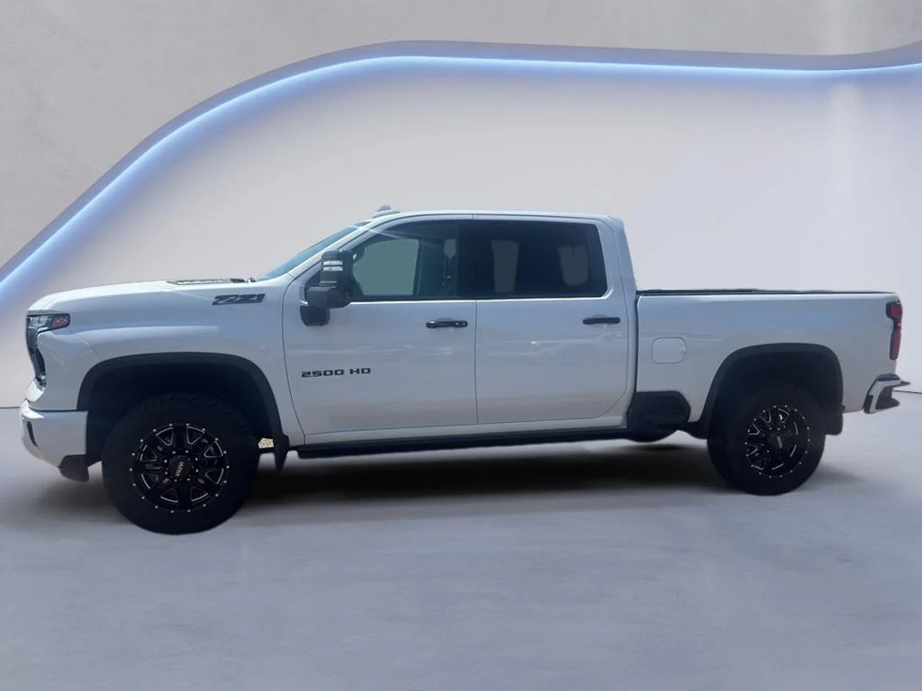 Used 2024 Summit White Chevrolet LTZ image 1
