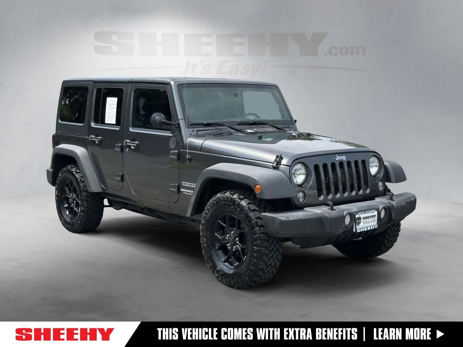 Used 2017 Gray Jeep Unlimited Sport image 1