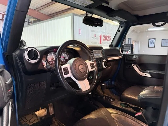 Used 2014 Blue Jeep Unlimited Sahara image 11