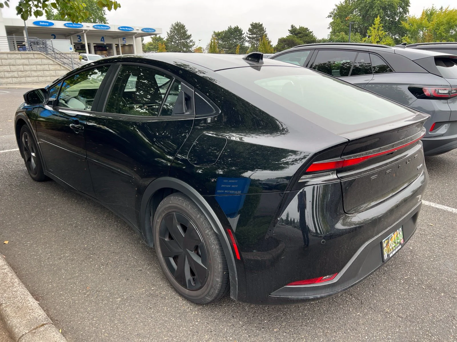 Used 2024 Midnight Black Metallic Toyota LE image 6