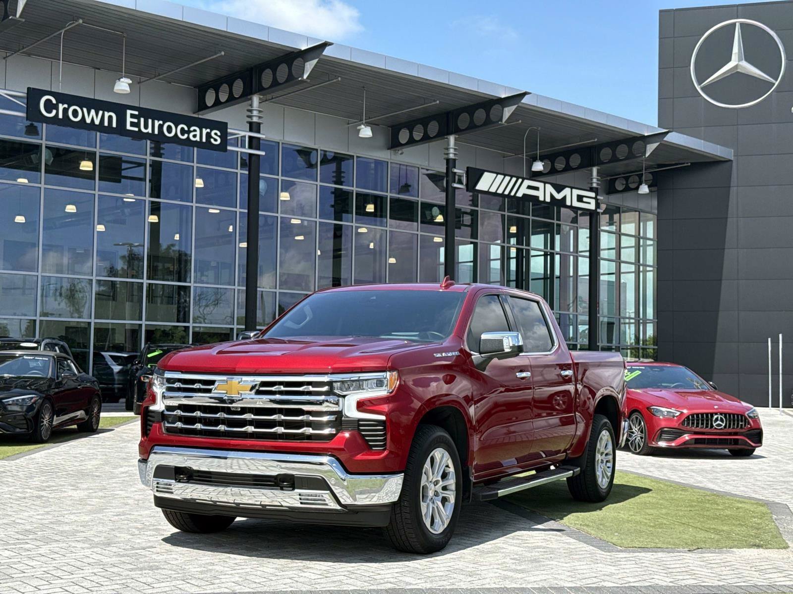 Used 2025 Radiant Red Tintcoat Chevrolet LTZ image 1