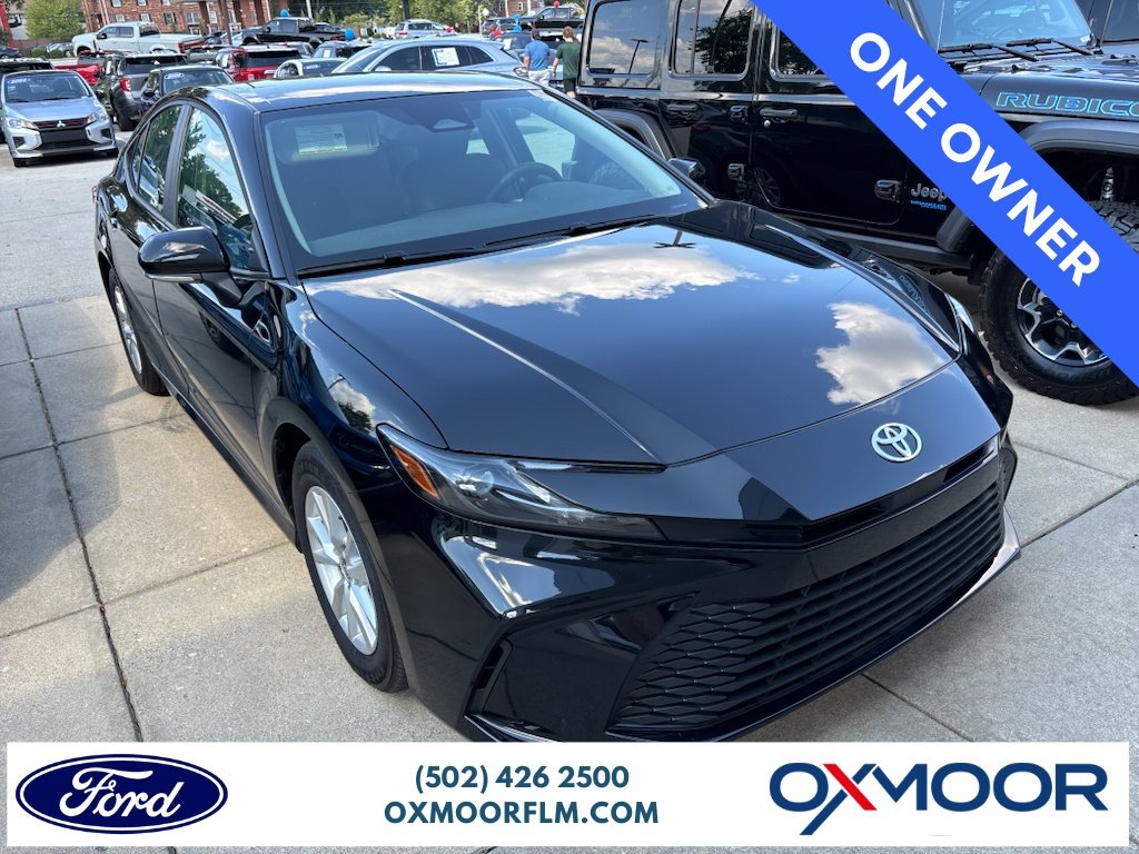 Used 2026 Midnight Black Metallic Toyota LE image 1