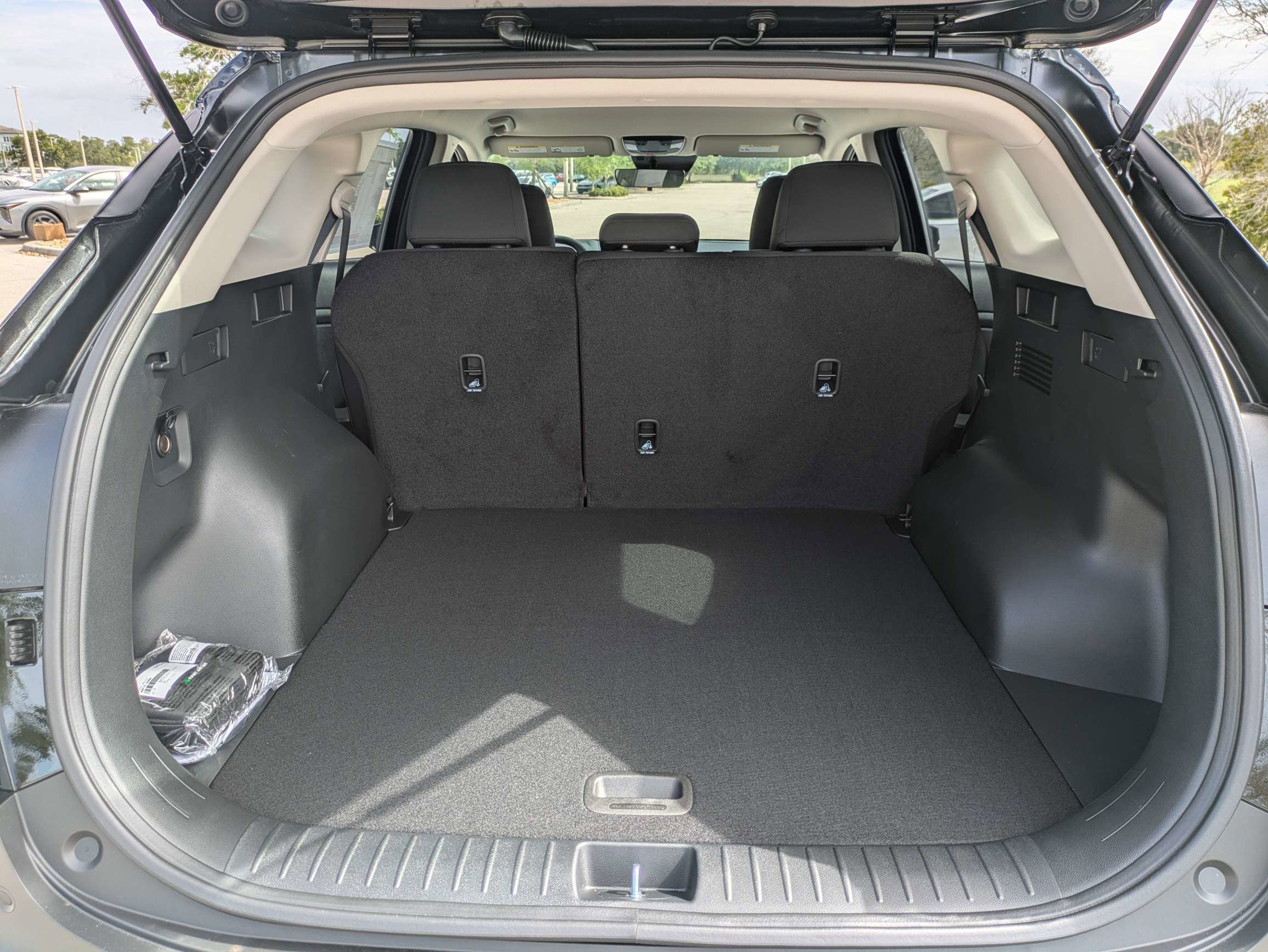 New 2026 Ebony Black Kia LX image 14