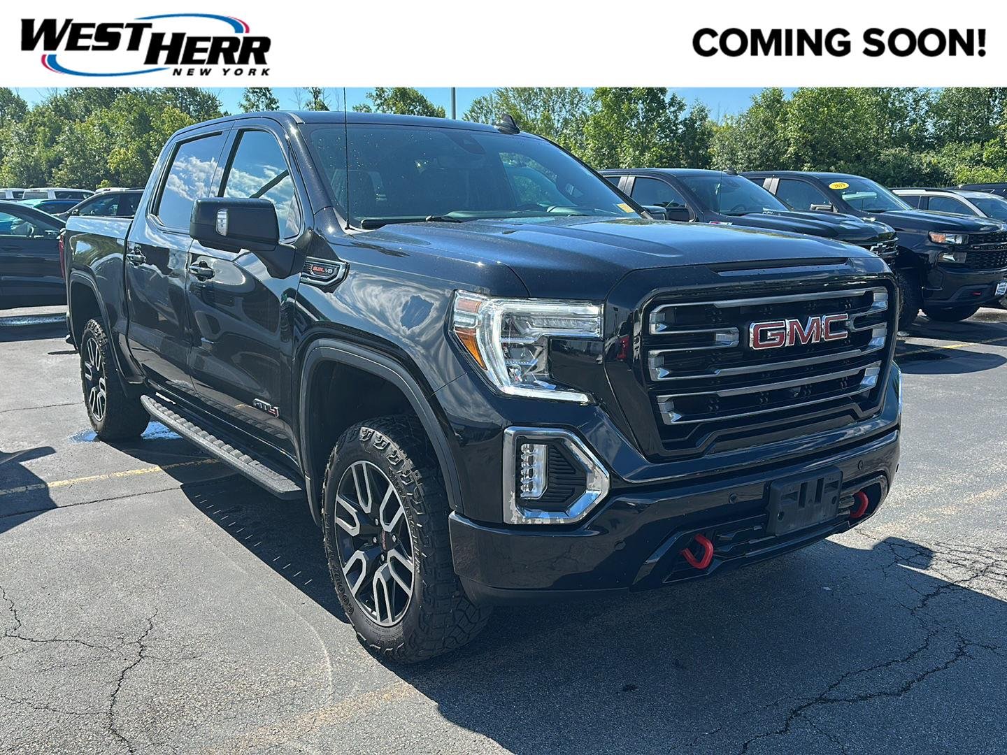 Used 2022 Ebony Twilight Metallic GMC AT4 image 1