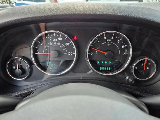 Used 2015 Red Jeep Unlimited Sahara image 28