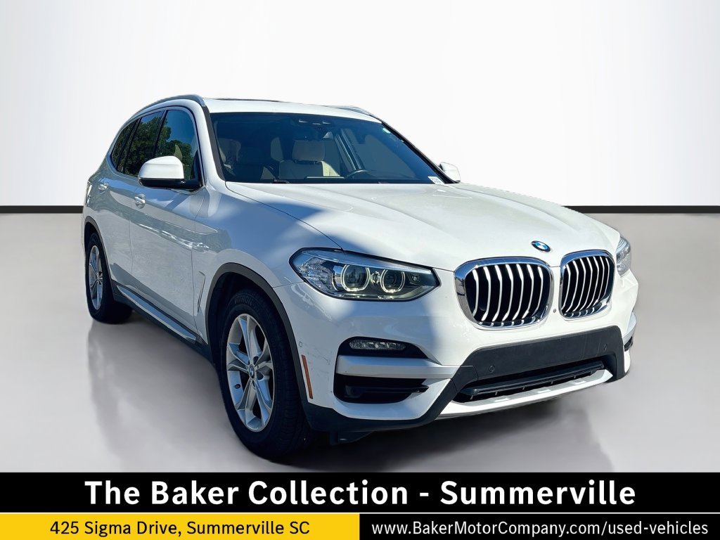 Used 2021 White BMW sDrive30i image 1