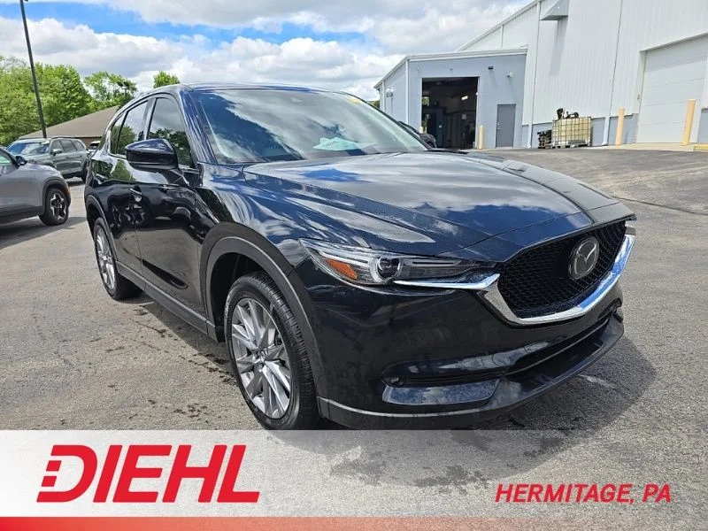Used 2021 Black Mazda Grand Touring image 1