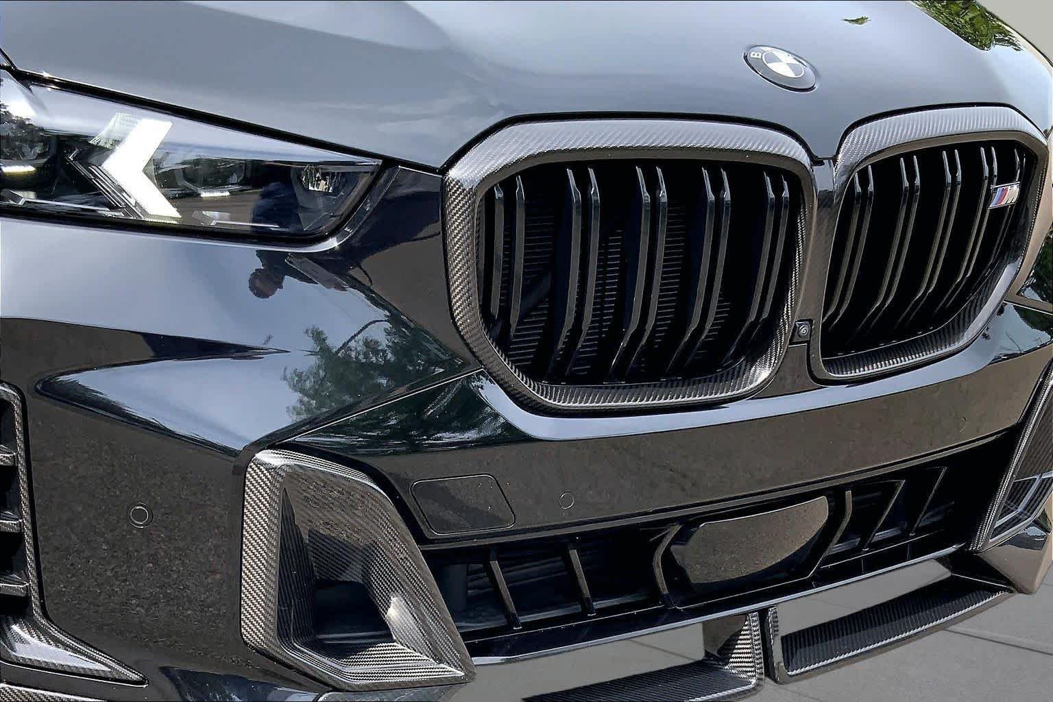 Used 2025 Black Sapphire Metallic BMW M60i image 29