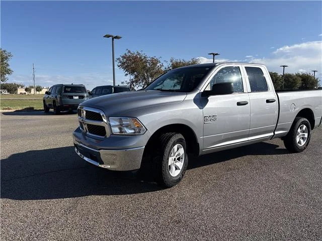 Used 2024 Granite Crystal Metallic Clearcoat RAM SLT 4x4 Quad Cab 6.3 ft. box 140 in. WB image 3