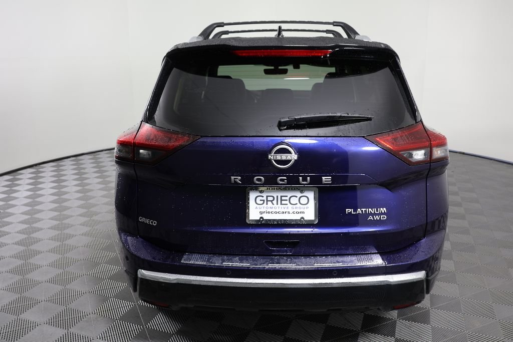 Used 2024 Deep Ocean Blue Nissan Platinum image 7