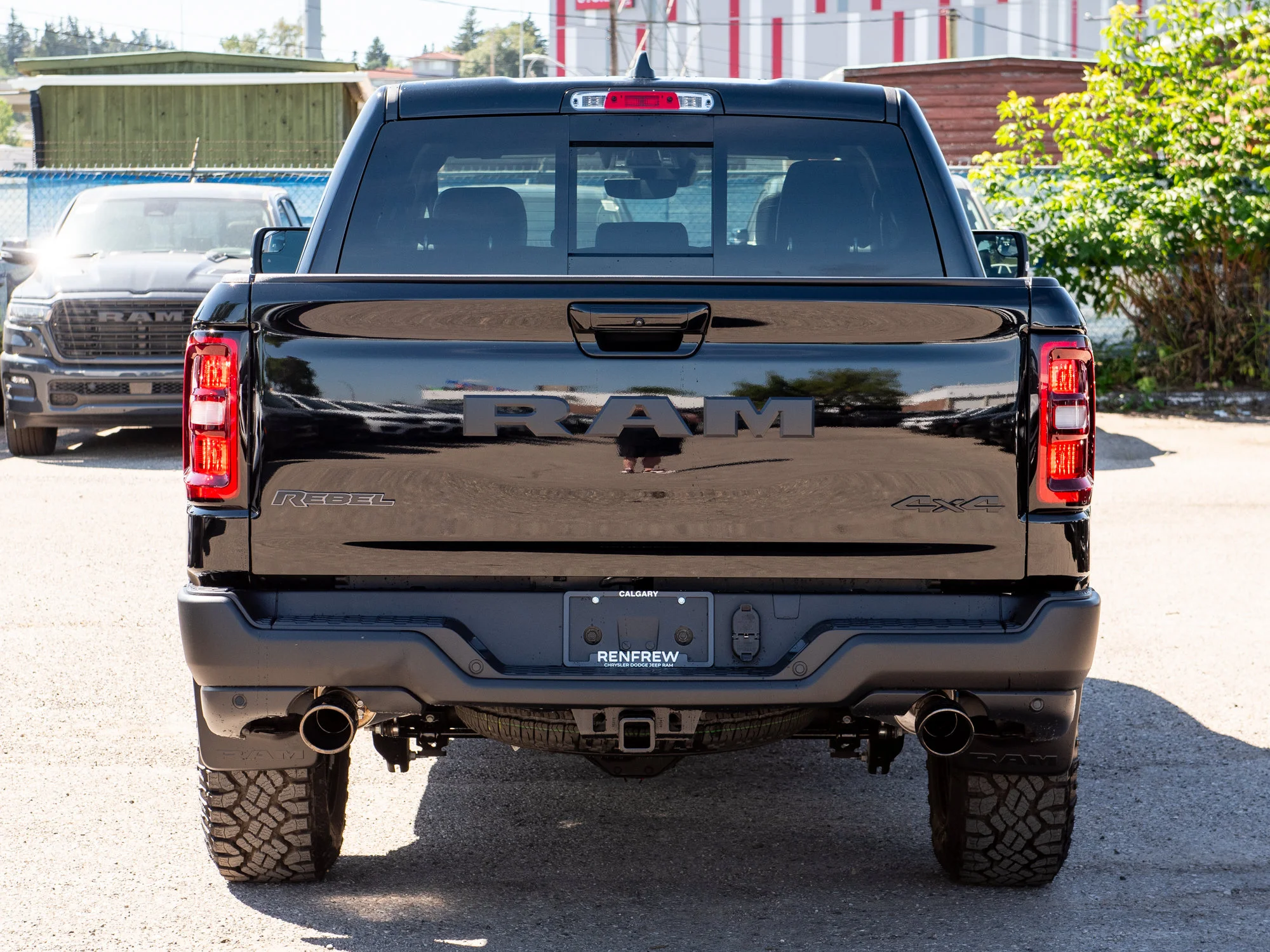 New 2026 Black RAM Rebel* Crew Cab 4x4, 33 Inch A/T Tires, Pano Sunroof, Passenger Screen image 6