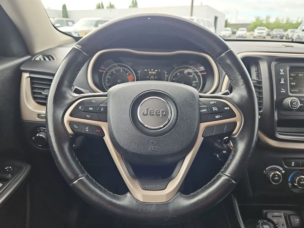 Used 2016 Granite Crystal Metallic Clearcoat Jeep Sport image 14