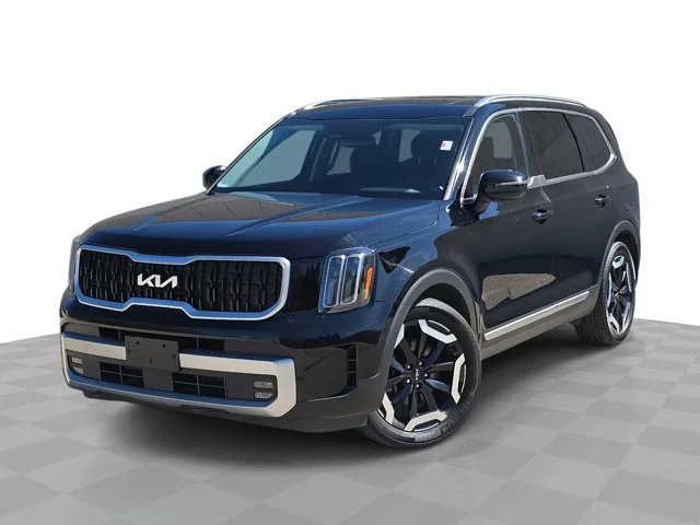 Used 2023 Ebony Black Kia EX image 1