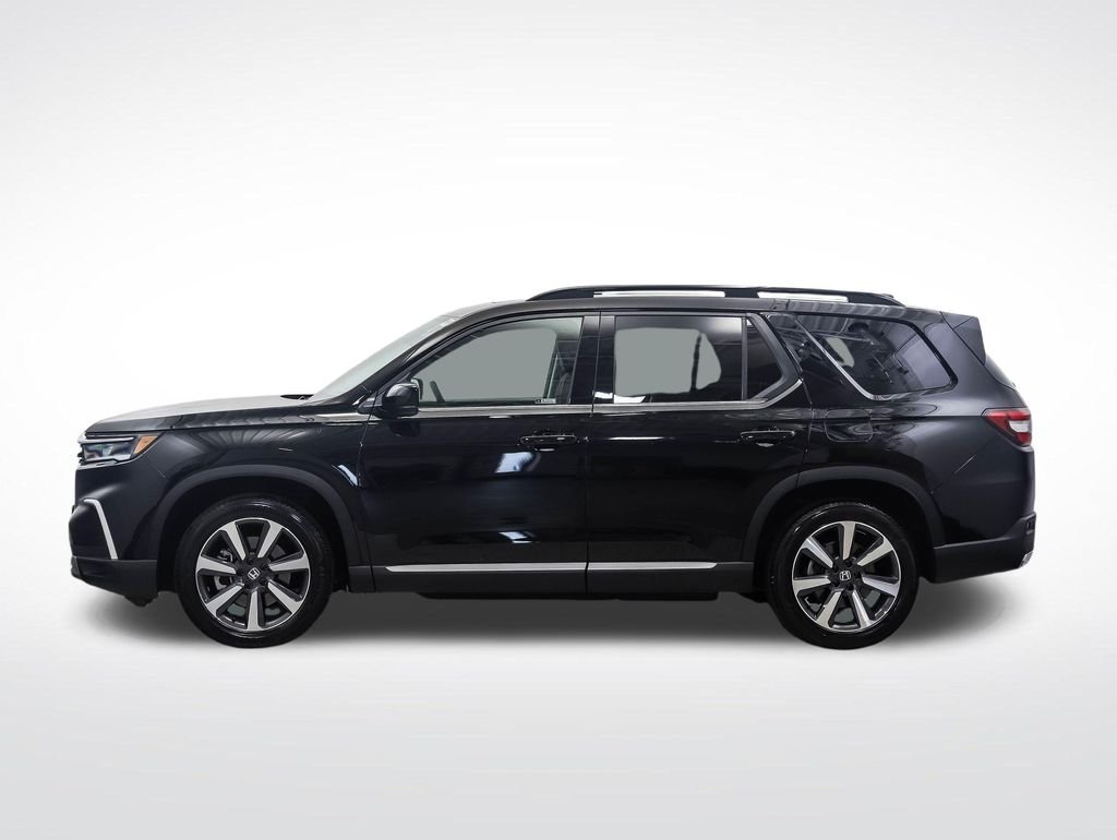Used 2023 Honda Pilot Touring with VIN 5FNYG1H73PB047539 for sale in Minneapolis, Minnesota