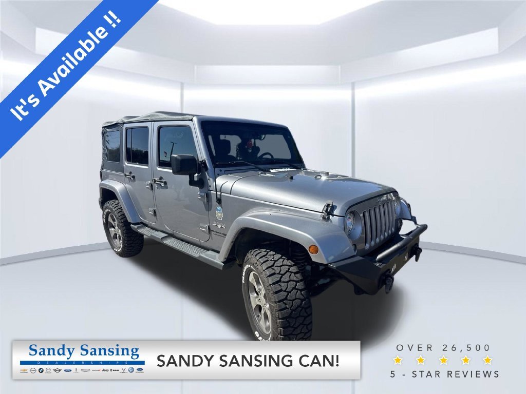Used 2018 Silver Jeep Unlimited Sahara image 1