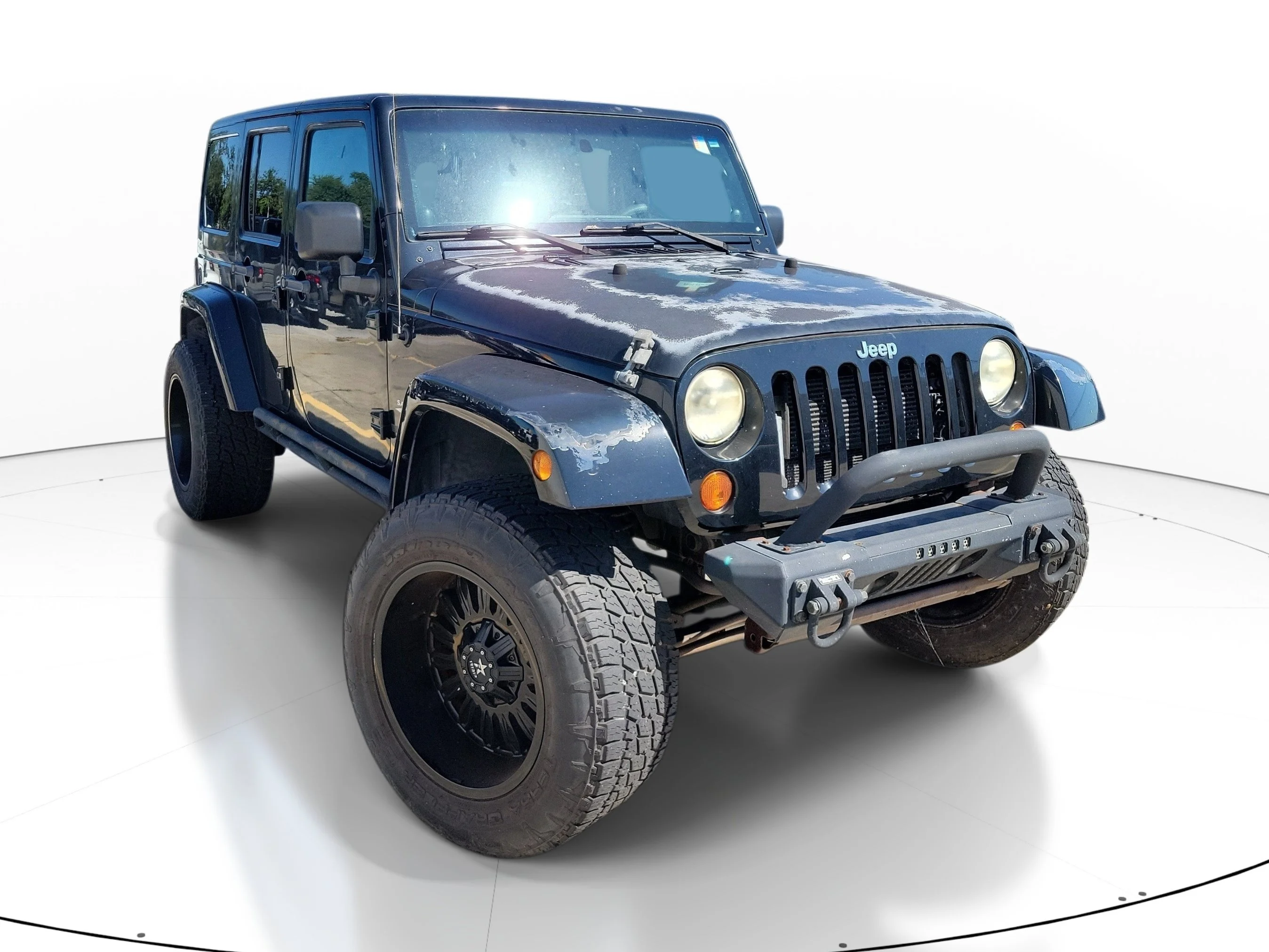 Used 2012 Black Jeep Sahara image 1
