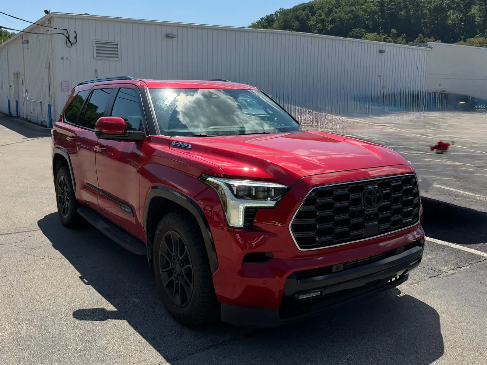 Used 2024 Supersonic Red Toyota Platinum image 3
