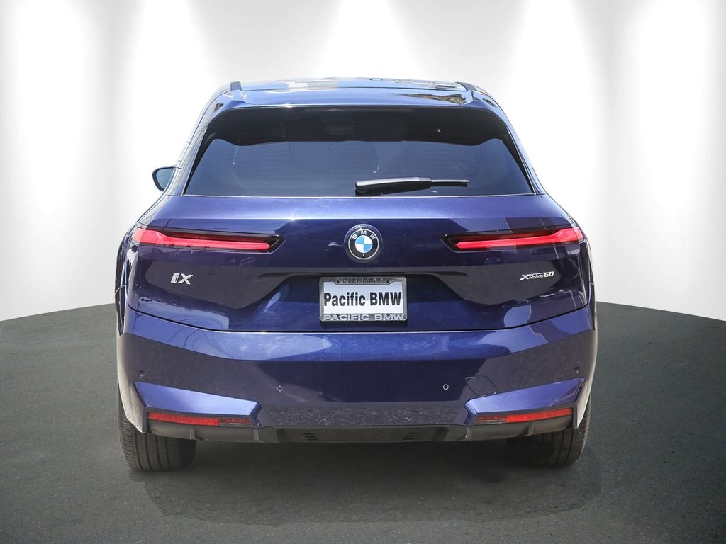 Used 2026 Tanzanite Blue II Metallic BMW xDrive60 image 5