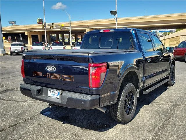 Used 2024 Blue Ford XLT 4x4 SuperCrew Cab 5.5 ft. box 145 in. WB image 4