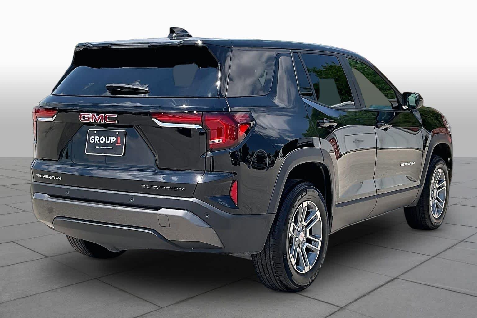 Used 2026 Ebony Twilight Metallic GMC FWD Elevation image 13