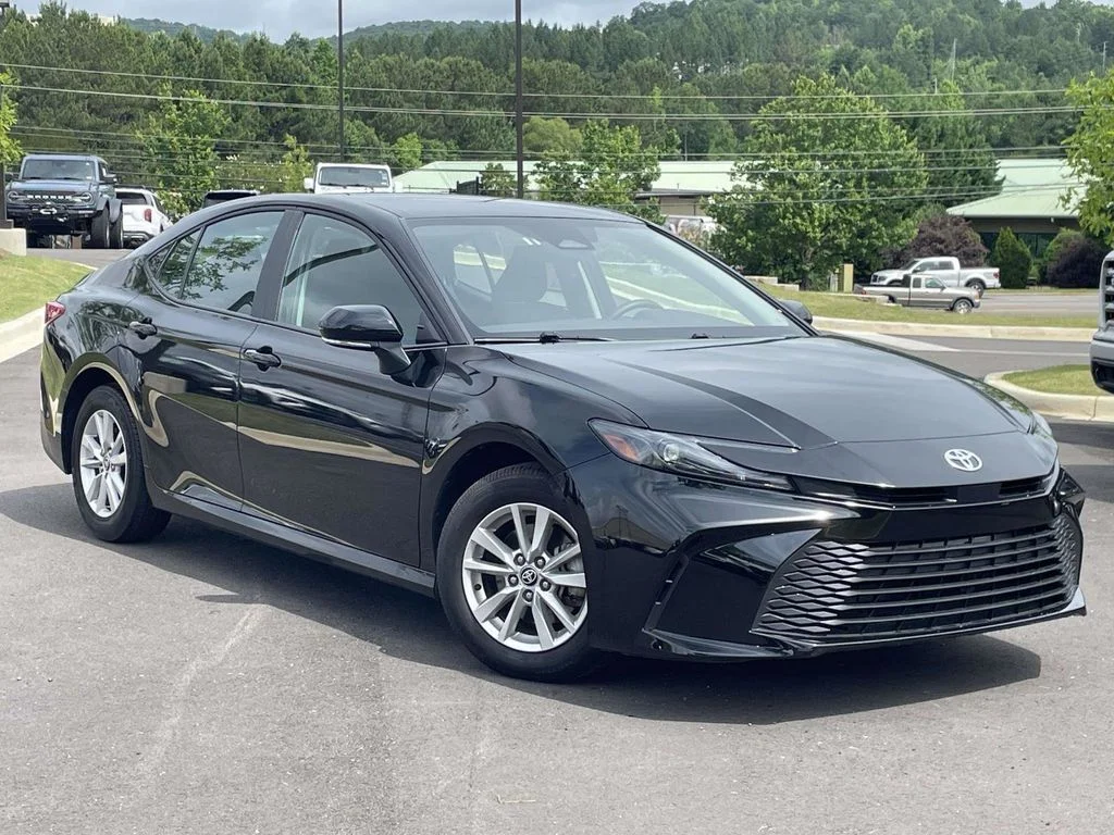 Used 2025 Black Toyota LE image 1
