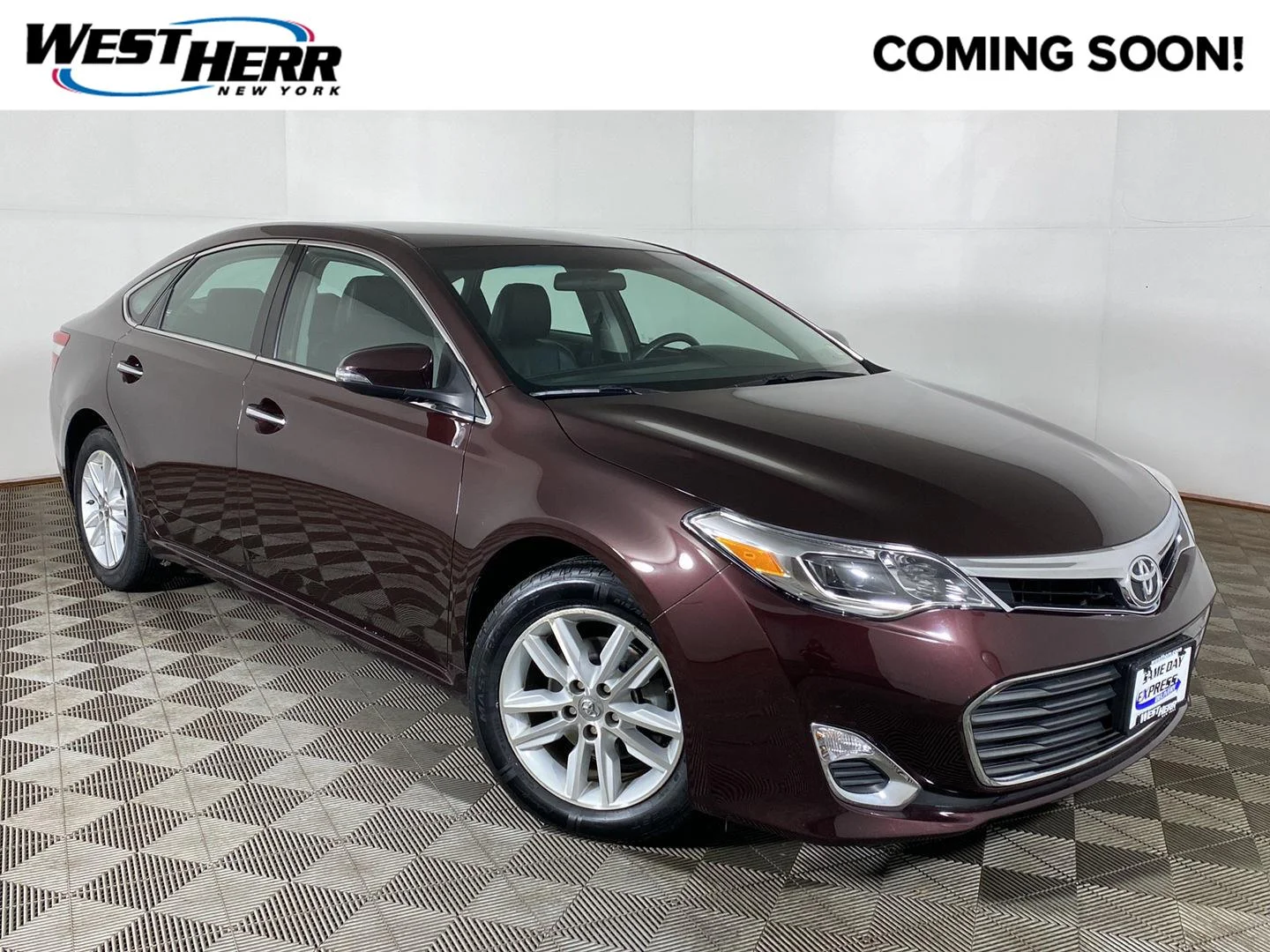 Used 2015 Sizzling Crimson Mica Toyota XLE image 1
