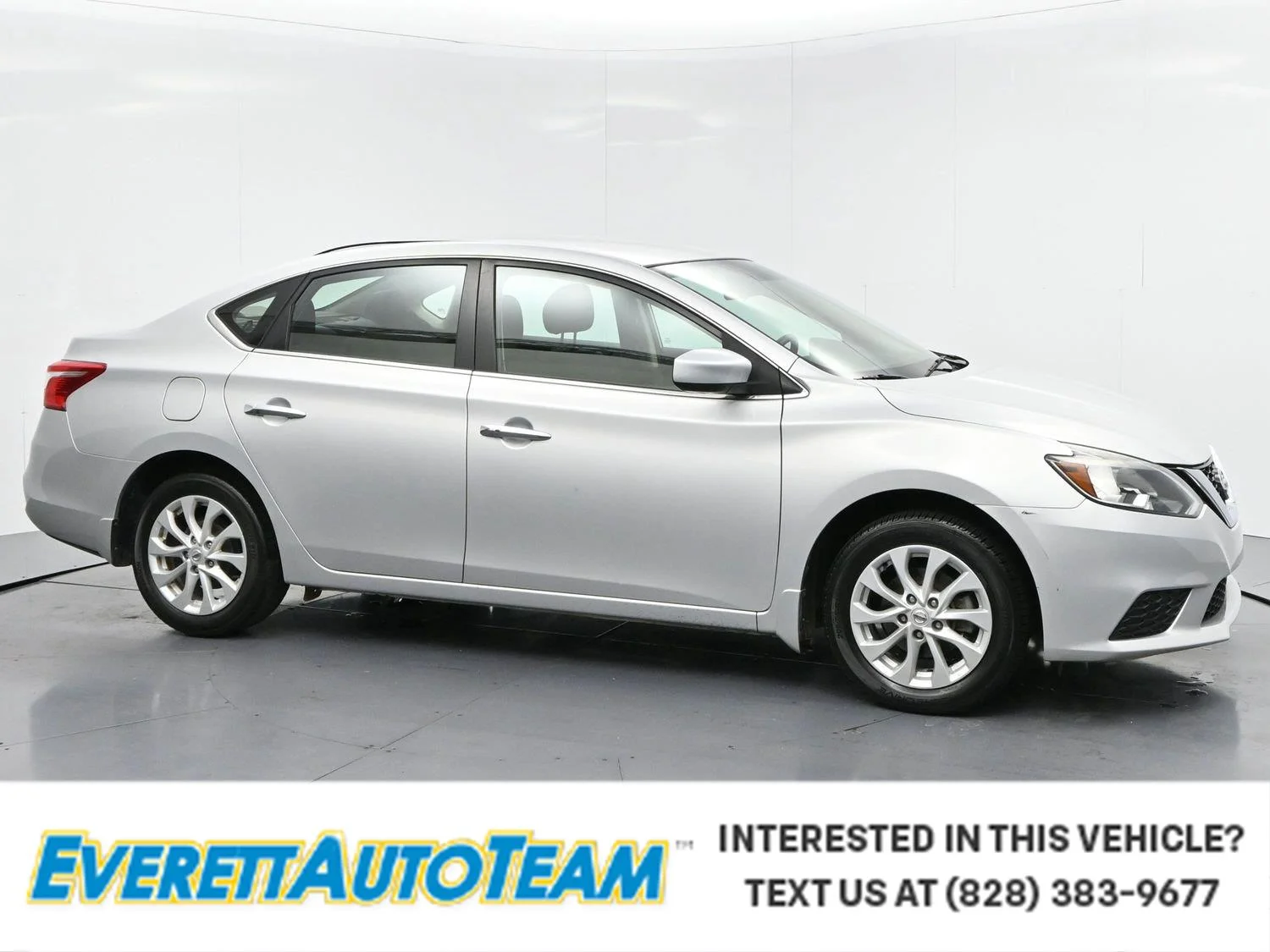 Used 2019 Brilliant Silver Metallic Nissan SV image 1