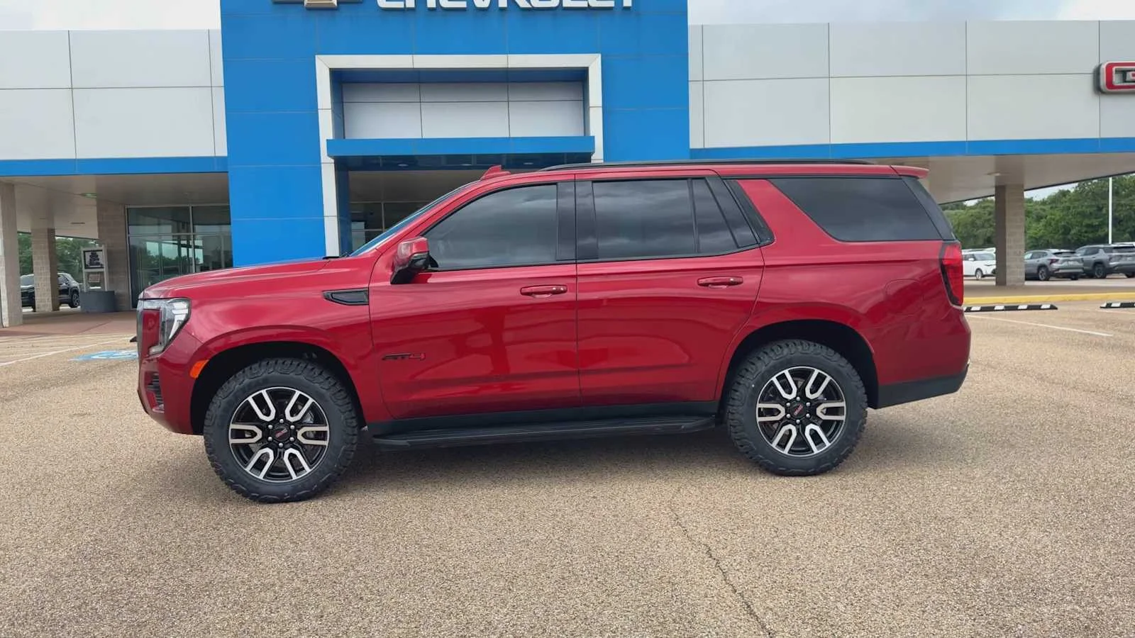 Used 2024 Volcanic Red Tintcoat GMC AT4 image 5