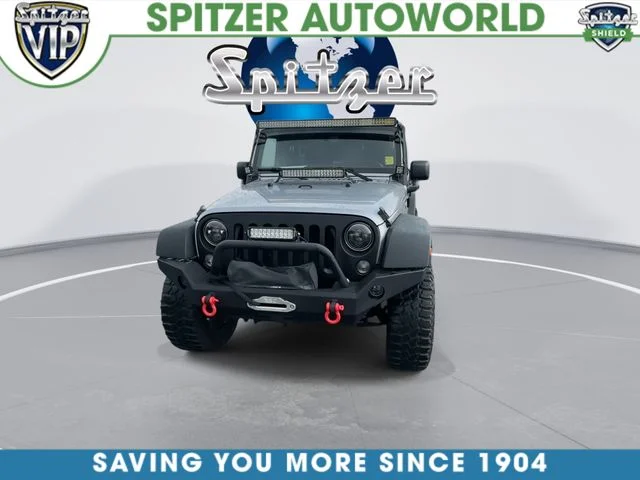 Used 2015 Silver Jeep Unlimited Sport image 3
