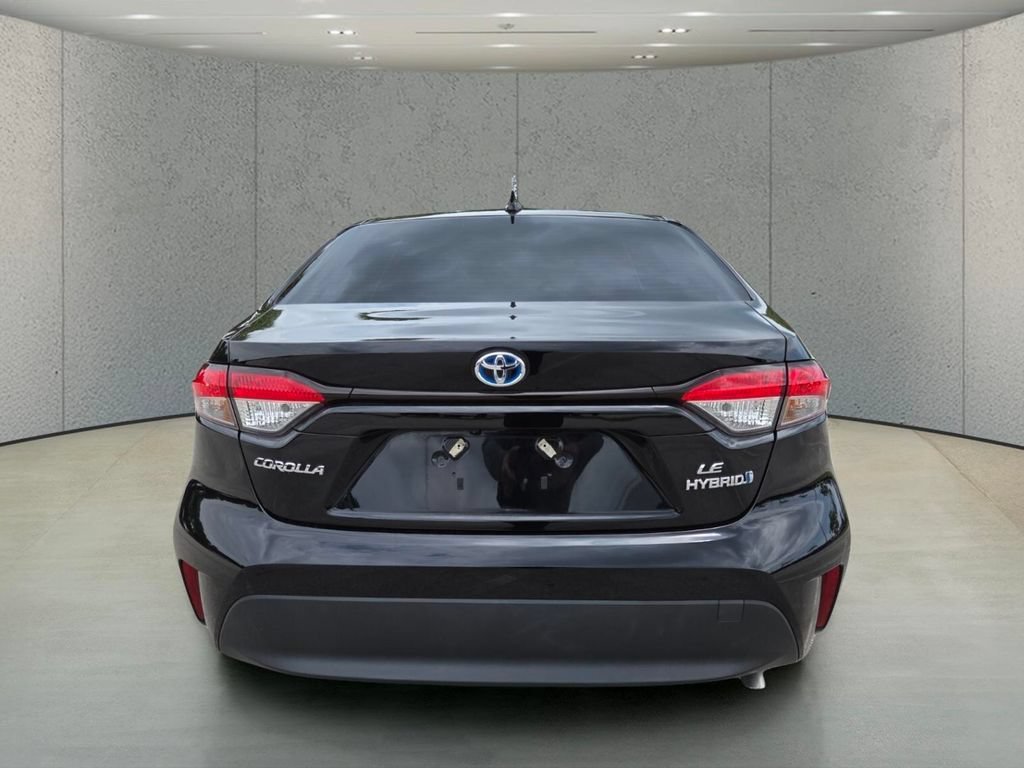 Used 2023 Midnight Black Metallic Toyota Hybrid LE image 6