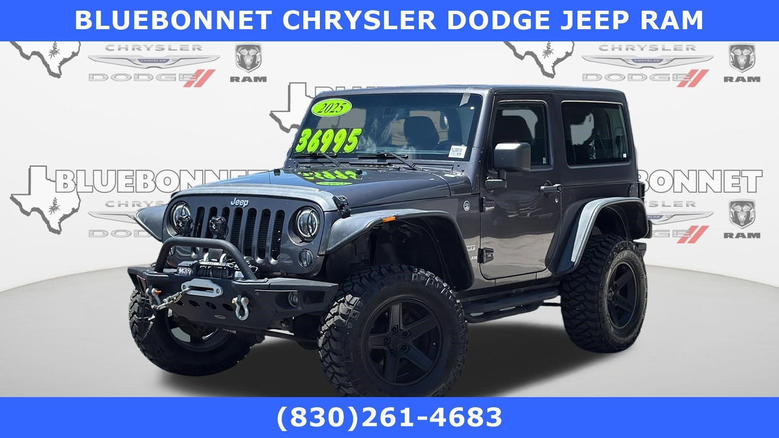 Used 2014 Granite Crystal Metallic Clearcoat Jeep Sport image 1