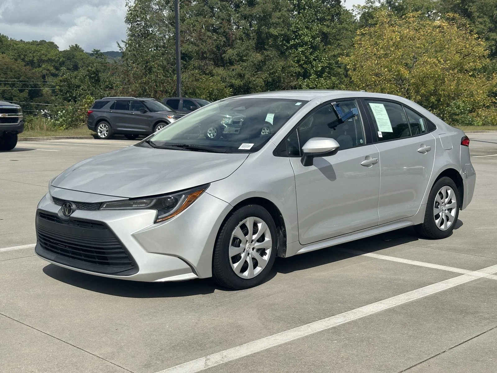 Used 2023 Classic Silver Metallic Toyota LE image 3