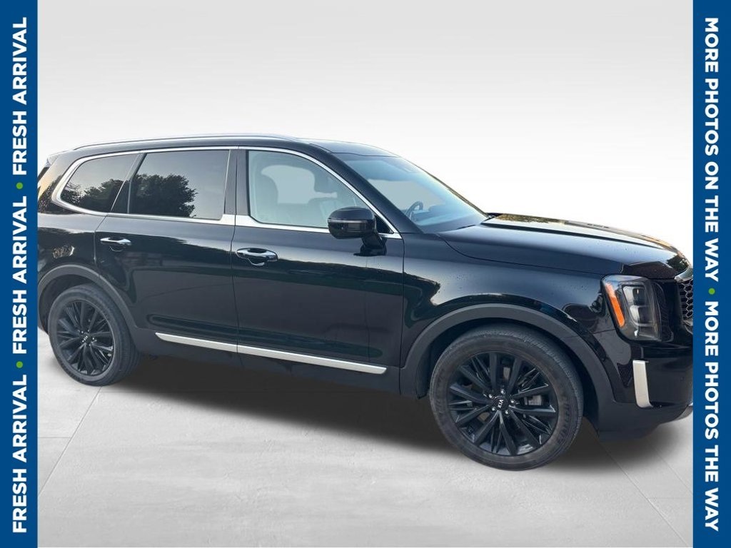Used 2021 Black Kia SX image 1