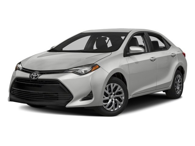 Used 2018 Super White Toyota LE image 1