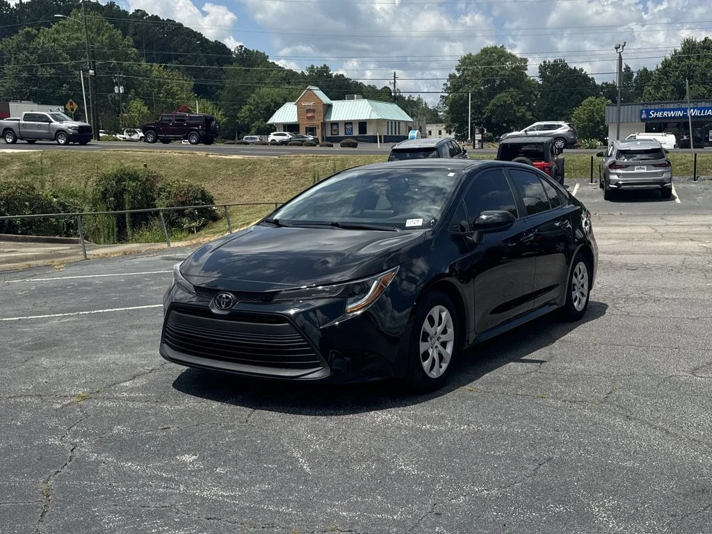 Used 2024 Black Toyota LE image 3
