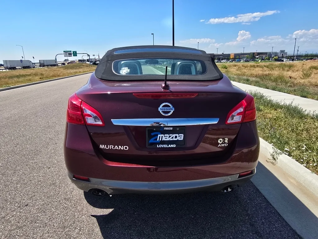 Used 2011 Merlot Metallic Nissan Base image 4