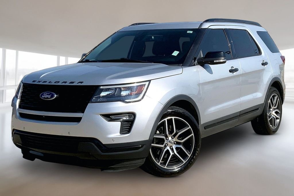 Used 2018 Ingot Silver Ford Sport image 1