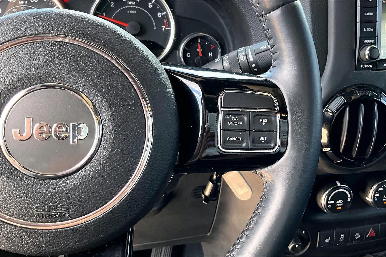 Used 2015 Black Clearcoat Jeep Altitude image 14