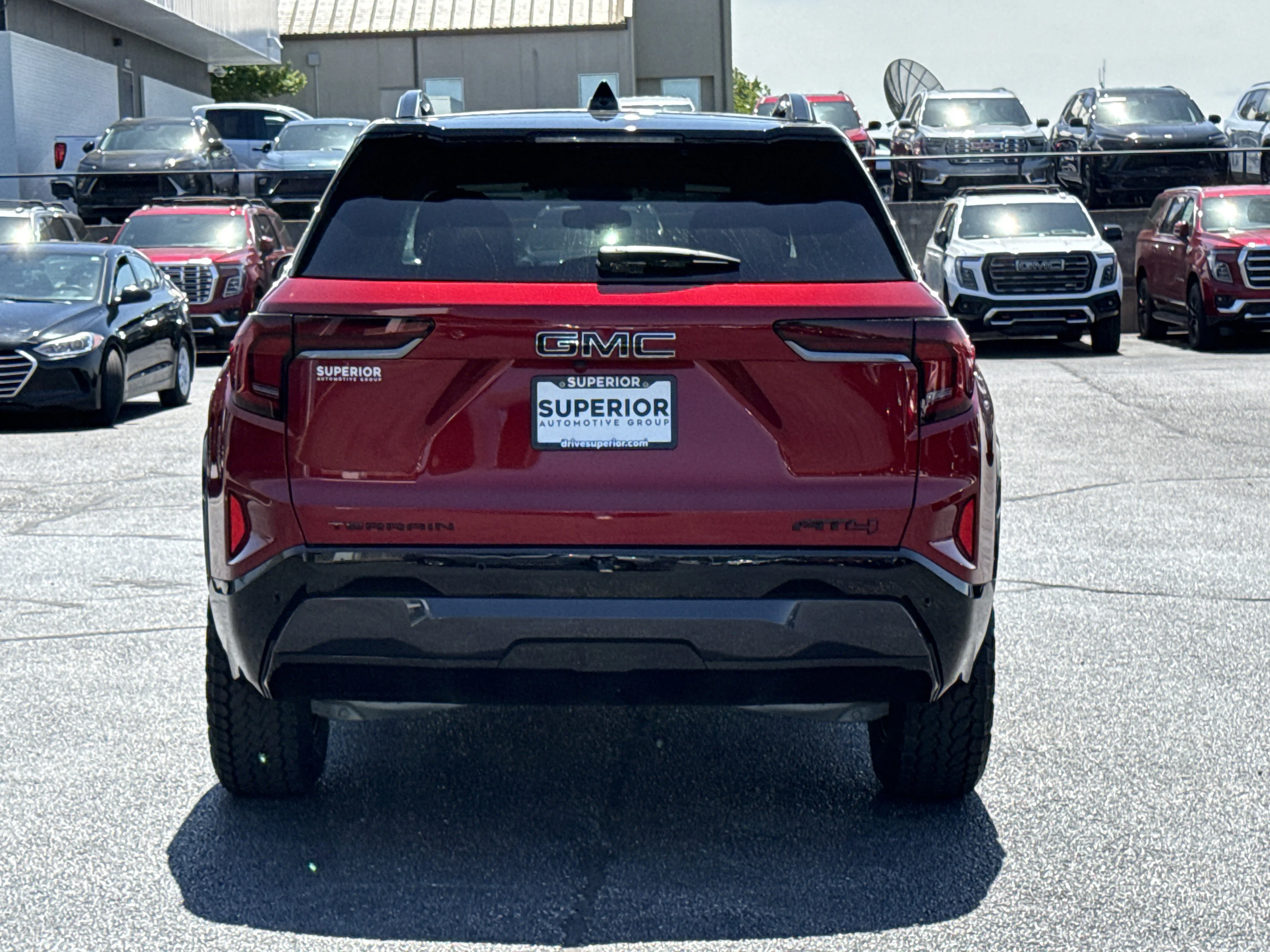 New 2026 Volcanic Red Tintcoat GMC AWD AT4 image 4