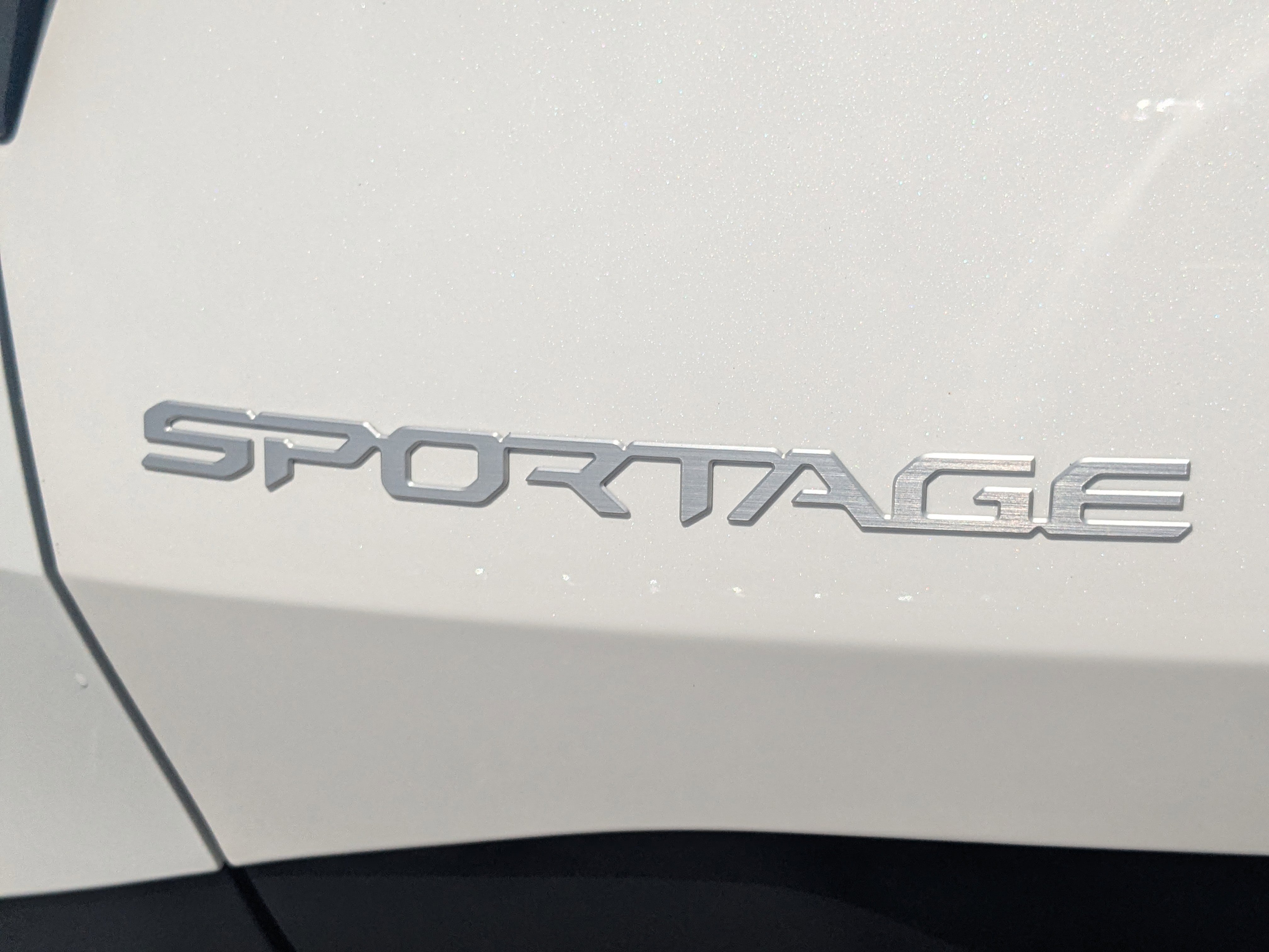 New 2026 Snow White Pearl Kia LX image 13