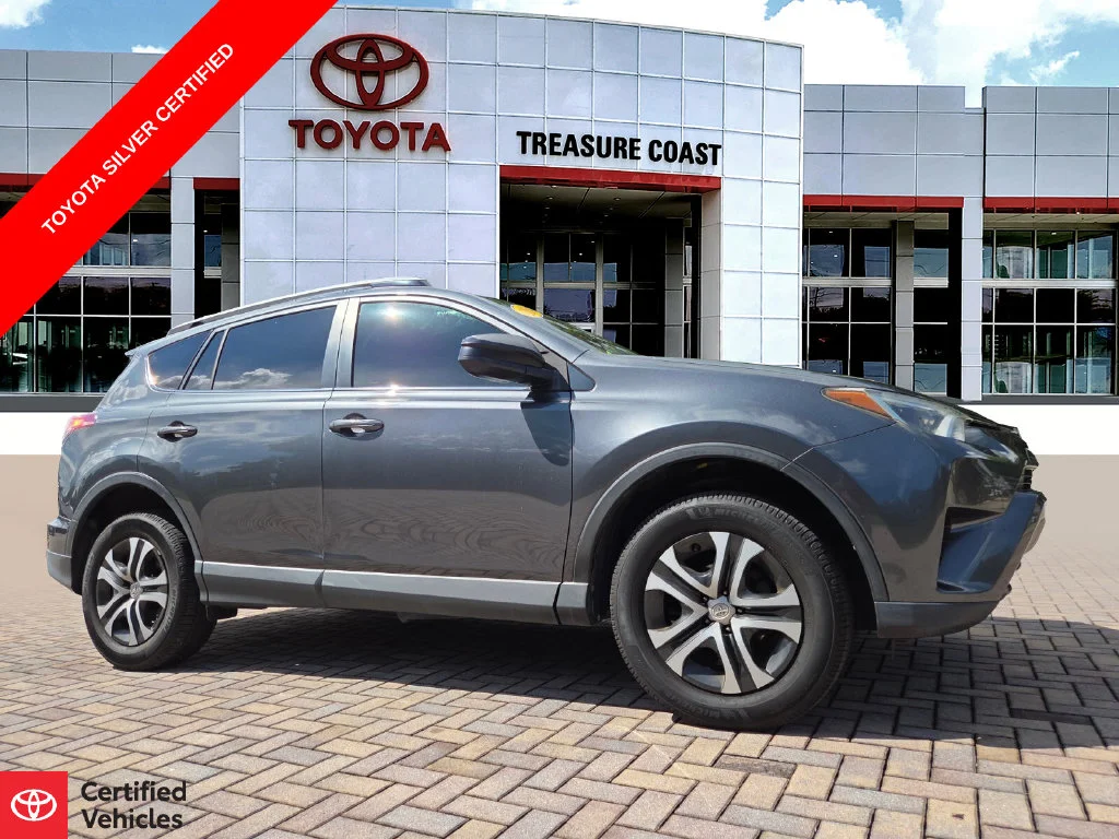 Used 2016 Gray Toyota LE image 1