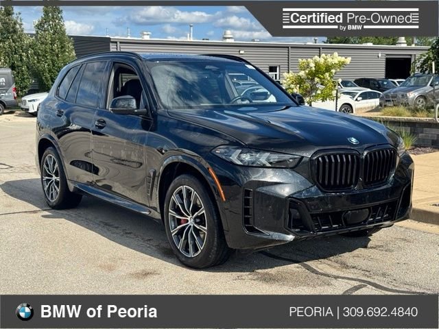 Certified Used 2024 Black Sapphire Metallic BMW xDrive40i image 1