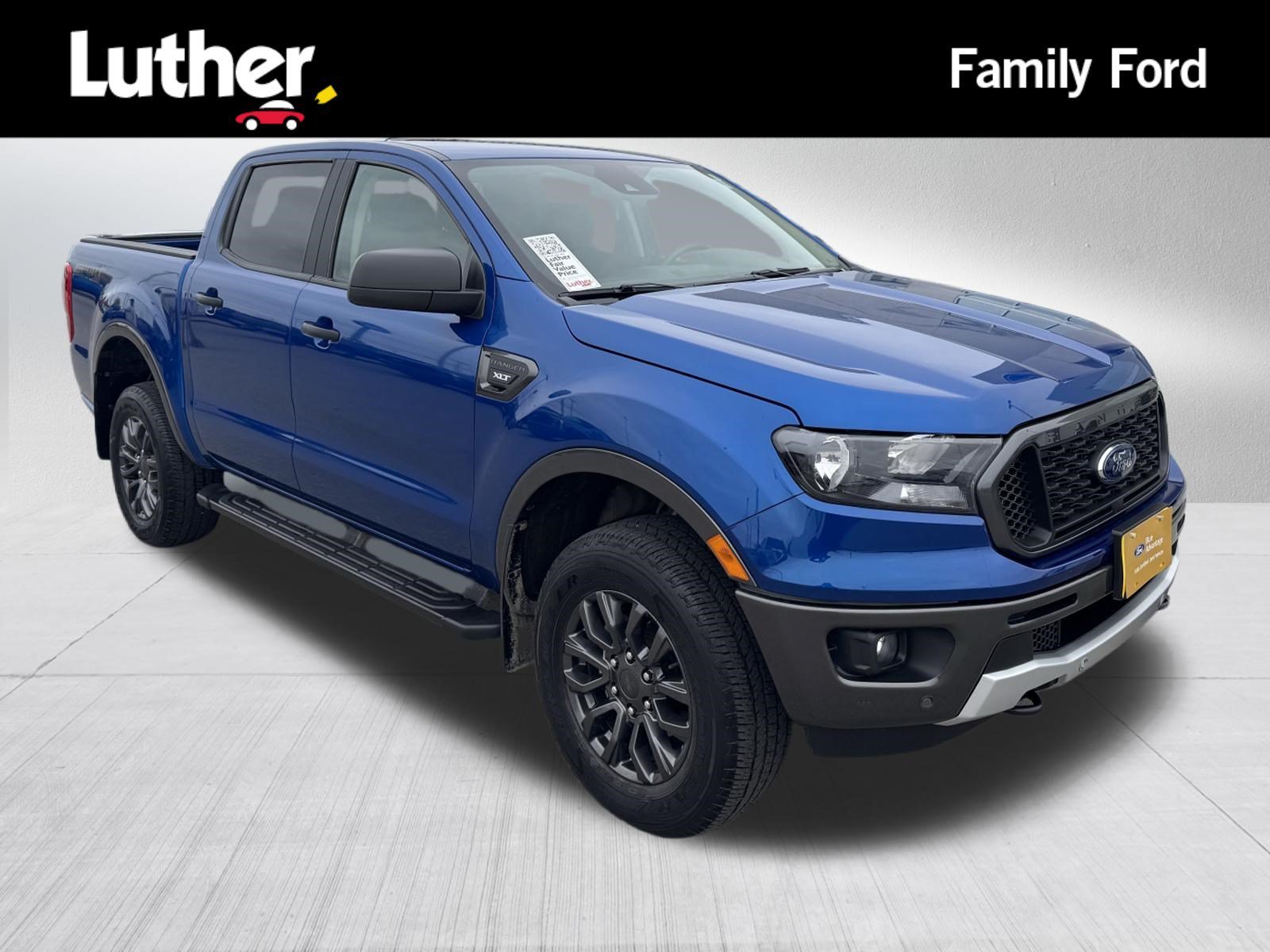 Certified Used 2019 Blue Lightning Ford XLT image 1
