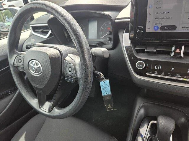 Used 2023 Classic Silver Metallic Toyota LE image 30