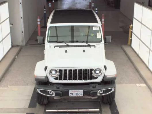 Used 2026 Jeep Wrangler 4-Door Sahara with VIN 1C4PJXEN0TW246704 for sale in Kansas City