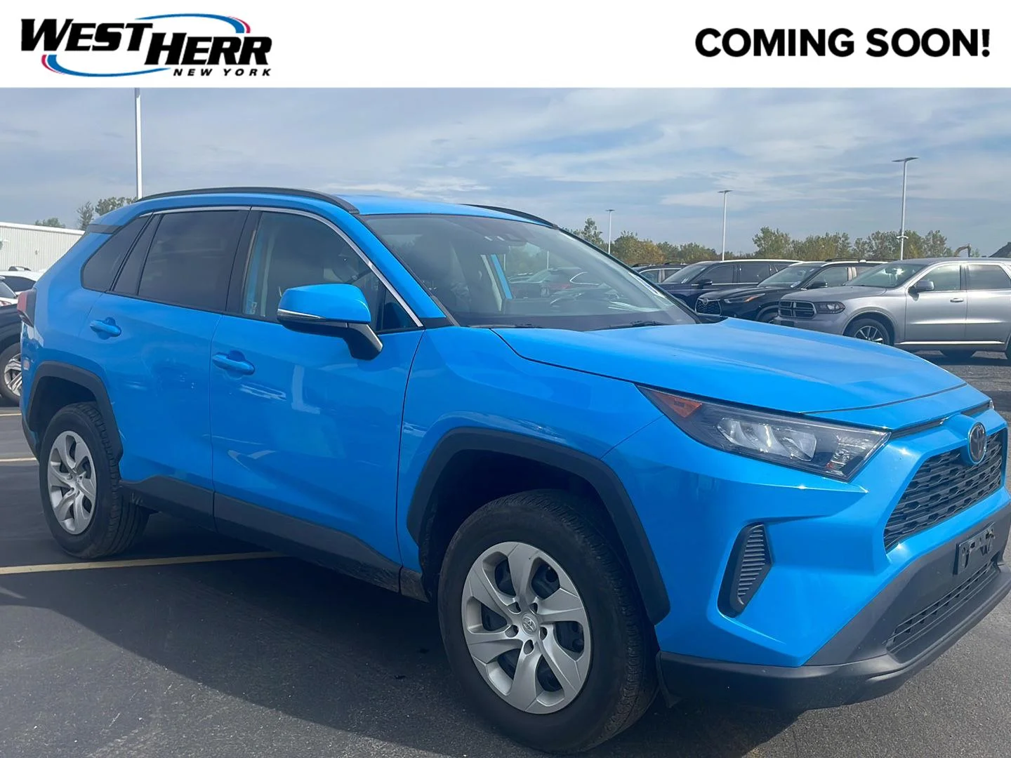 Used 2019 Blue Flame Toyota LE image 1