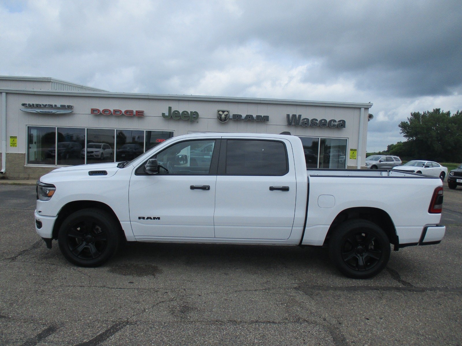 Used 2023 RAM Ram 1500 Pickup Big Horn/Lone Star with VIN 1C6RRFFGXPN528069 for sale in Waseca, Minnesota