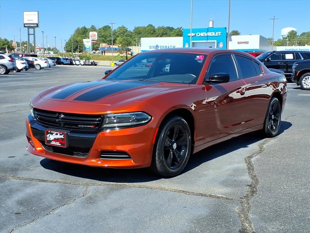 Used 2023 Orange Dodge SXT image 1